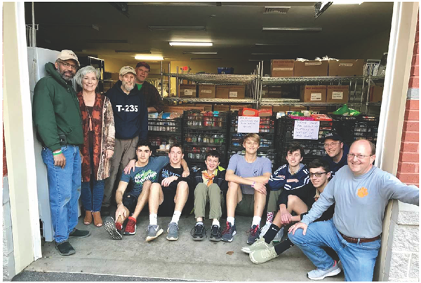 Clemson Boy Scouts collect food for Clemson Community Care